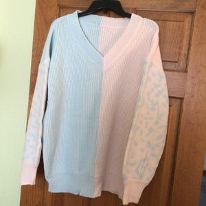 C.Cline size xlg color Light Pink and Light. blue  Vnevk Woman’s Sweater